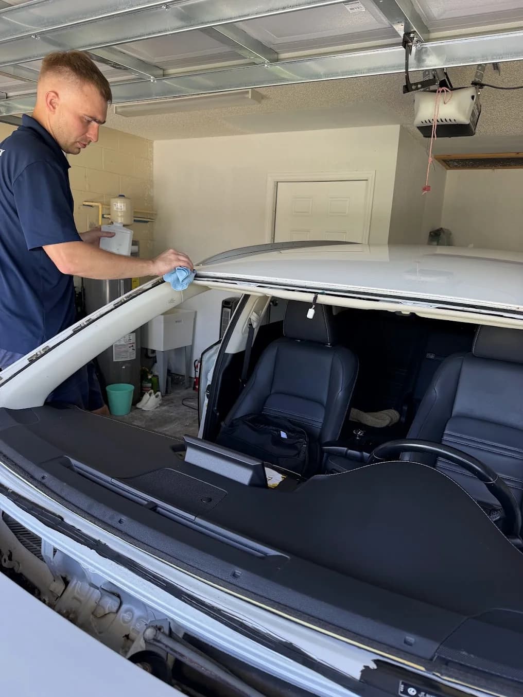 Starplex technician preparing a vehicle for new glass